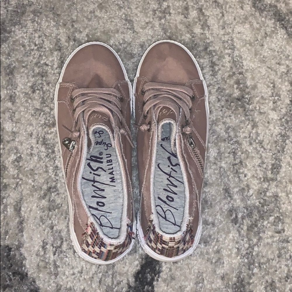 Light pink blowfish shoes.